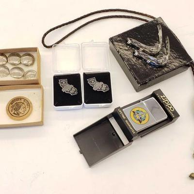 #722: Costume Jewelry, 2 Oakland A's World Series Pins, Brand New Zippo Lighter, Wooden Nickel and Buttons
Costume Jewelry, 2 Oakland A's...
