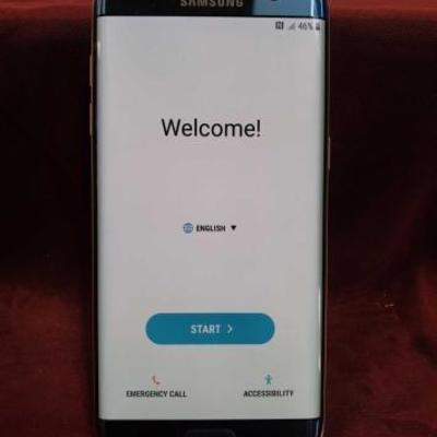 #745: Blue 32gb AT&T Samsung Galaxy S7 Edge
In original box, includes unused headphones and charger

