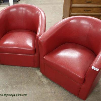  Pair of Red Leather Style Chairs

Located Inside â€“ Auction Estimate $100-$300 