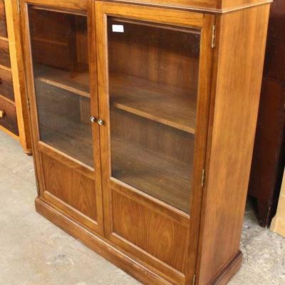Walnut 2 Door Bookcase â€“ auction estimate $100-$300 - Located Inside 
