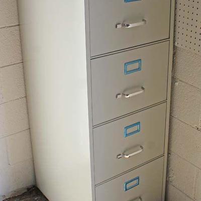  NEW 4 Drawer Metal File Cabinet with Keys

auction estimate $50-$100 â€“ located inside 