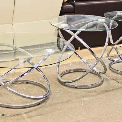  3 Piece Modern Design Glass Top and Chrome Base Coffee Table and 2 Lamp Tables

auction estimate $100-$300 â€“ located inside 