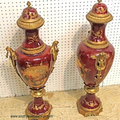  PAIR of Porcelain Bronze Wrap Serves Style Urns

auction estimate $300-$600 â€“ located inside 
