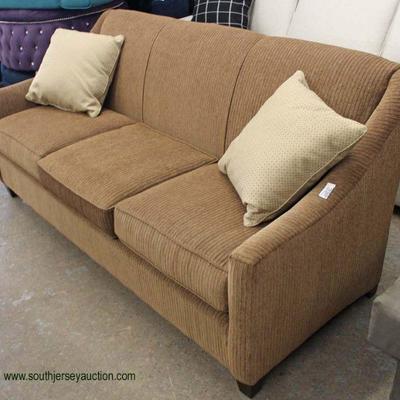  NEW â€œBassett Furnitureâ€ Upholstered Sofa with Pillows

auction estimate $200-$400 â€“ located inside 