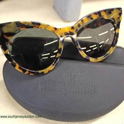  â€œKaren Walkerâ€ Starburst 150 605 Designer Sun Glasses with a Neiman Marcus case

auction estimate $100-$300 â€“ located inside 
