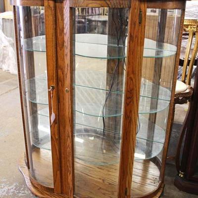 Serpentine Front Oak Mirror Back China Cabinet â€“ auction estimate $100-$300 - Located Inside