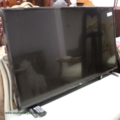 Selection of Flat Screen Televisions with Remotes â€“ auction estimate $100-$300 â€“ Located Inside