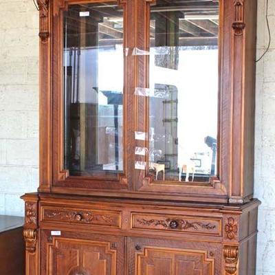  ANTIQUE Walnut Carved and Ornate Monumental 2 Piece Bookcase â€“ auction estimate $300-$600 â€“ located dock

  