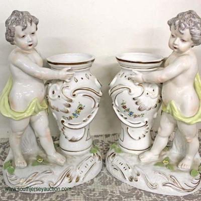  PAIR of Porcelain French Style Cherub Vases

auction estimate $100-$200 â€“ located inside 