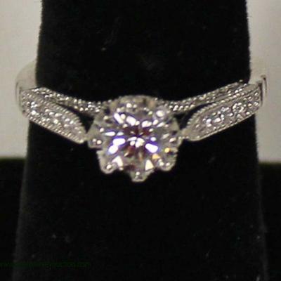  14 Karat White Gold 1 CTW Diamond Engagement Ring with .70 CT Center Diamond

auction estimate $1500-$2500 â€“ located inside 