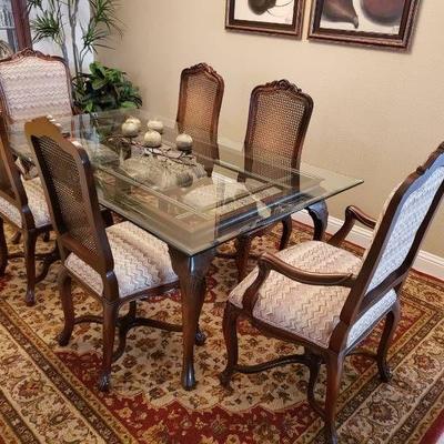 Glass dining tables and 6 chairs