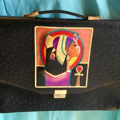 Marvin Sins Briefcase.  Marvin Sins know for the Art of Leather purses, coin purses, business card holders, wallets.