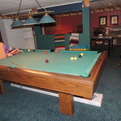 Sears Brunswick pool table with pool sticks, balls, rack