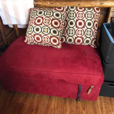 Red ottoman with storage 