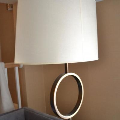 One of a pair of contemporary floor lamps...