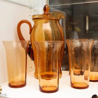 Depression glass pitcher and glasses