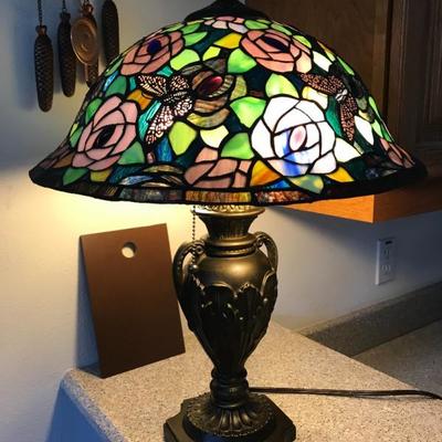 One of several Tiffany style lamps 