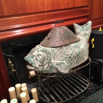 Fish shaped barbecue on wrought iron stand made in Mexico