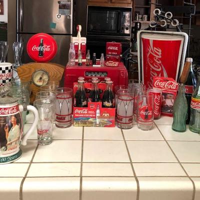 Assorted Coca Cola Collectibles and Neon Signs