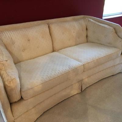 Low profile cream color sofa (needs cleaning) - (68