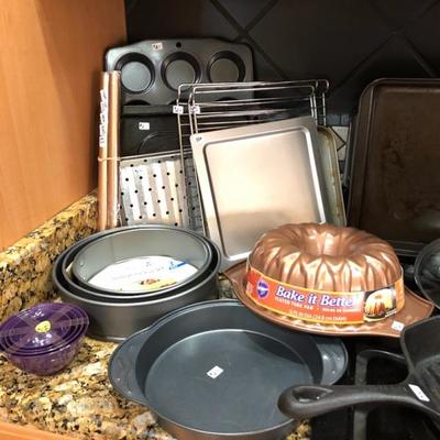 Kitchen cookware, glassware, dishes, bake wear, & appliances.