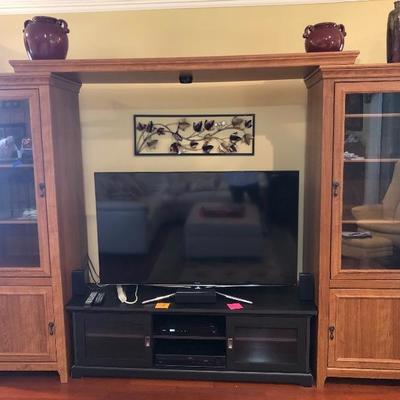 Bush Furniture entertainment center, oak finish, two towers with cross piece (Each tower 26