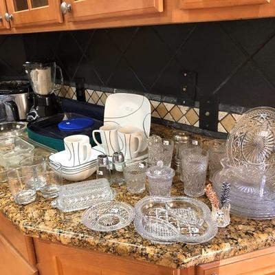 Kitchen cookware, glassware, dishes, bake wear, & appliances.
