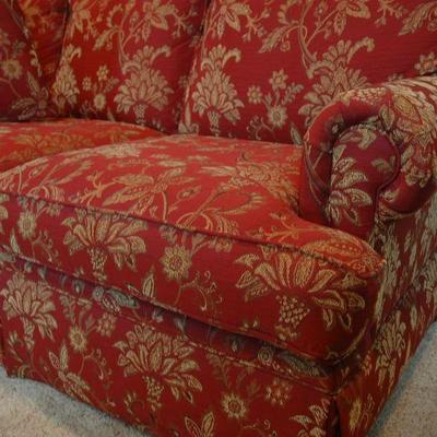 Bassett Couch.  Dark red with beige floral print.  87