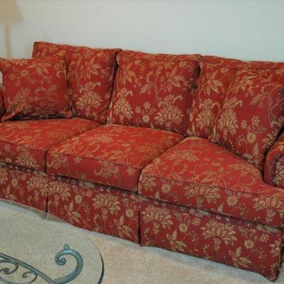 Bassett Couch.  Dark red with beige floral print.  87