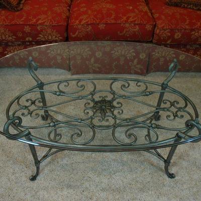 Beveled glass top coffee table.  48