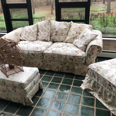 The floral sofa, chair, ottoman are all from Crate & Barrel and have slipcovers covering them - the slipcovers can be removed if the...
