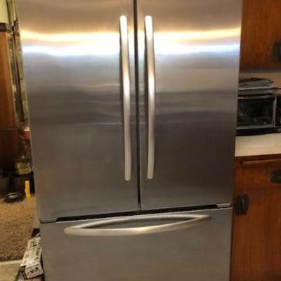 Practically unused stainless finish 3 door refrigerator