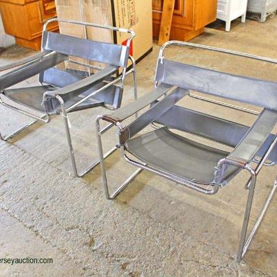  PAIR of Leather and Chrome Modern Design Arm Chairs

Located Inside â€“ Auction Estimate $200-$400 
