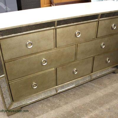  NEW Contemporary Deocrator 8 Drawer Low Chest with Mirror Accents

Located Inside â€“ Auction Estimate $200-$400

  