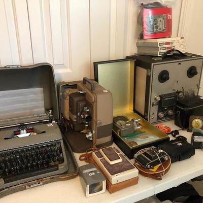 Vintage typewriter, cameras, projector