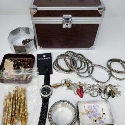 
#650: Misc Costume Jewelry with Jewelry Box, Bracelets, Rings, Necklaces, and More
Misc Costume Jewelry with Jewelry Box, Bracelets,...