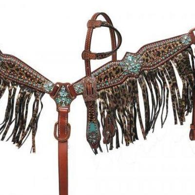 
#713: PONY SIZE Bejeweled metallic leopard print headstall and breast collar set
This set features medium leather with a metallic...