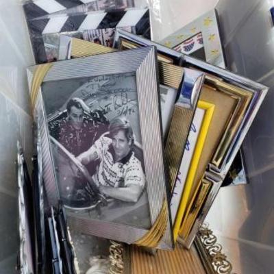 #1083: Tote of Signed Photos and Picture Frames
Tote of Signed Photos and Picture Frames