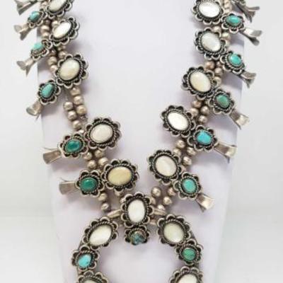 #505: Large Vintage Sterling Silver Squash Blossom with Authintic Turquoise and Mother of Pearl Stones
Necklace measures approx 30