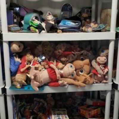 
#1045: 5 Shelves of Assorted E.T. Plush Toys, Books, Back Pack, KeyChains and More
5 Shelves of Assorted E.T. Plush Toys, Books, Back...