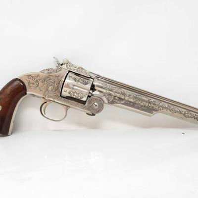 
#363: Replica Wyatt Earp Smith & Wesson. 44 Engraved Schofield Revolver NOT A FIREARM! 
Includes original box. This is NOT a firearm!...