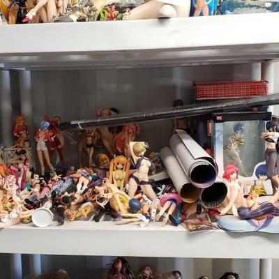 
#12771: Shelf of Anime Nude and Clothed Figurines, 2 Still Boxed, Posters and More...
Shelf of Anime Nude and Clothed Figurines, 2 Still...