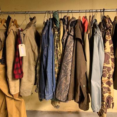 Lot of mens hunting clothes and a pair of waders  