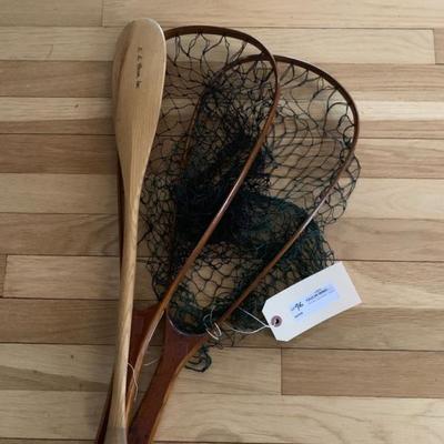 Two mahogany fishing nets together with an LL Bean miniature paddle  
