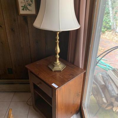 Pine 1 drawer table with a heavy brass lamp  