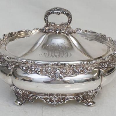 Dominick & Haff American Sterling Silver Covered Vegetable Tureen c. 1890-1900. Of shaped oval form, rococo scroll rim, with two stylized...