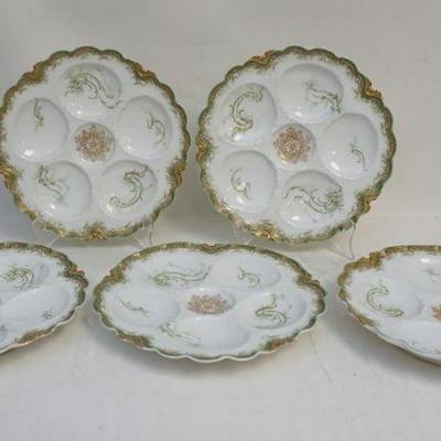 Five (5) Antique Haviland & Co. Limoges, France Porcelain Oyster Plates. Scalloped rims, they have five oyster wells and a center sauce...