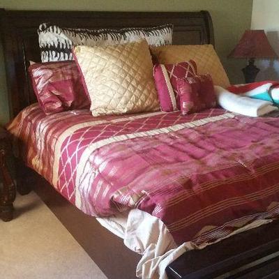 King Bed, drawers at foot of bed with Gently used mattress.Pair of matching night tables