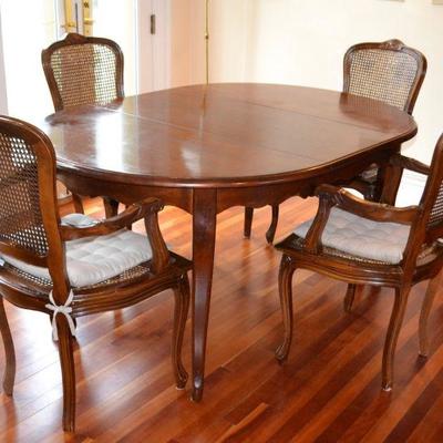 French Provincial dining table and 4 caned chairs