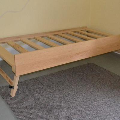 One fo a pair of trundle beds